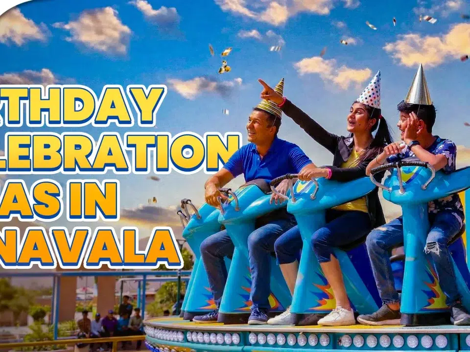 Family wearing party hats on an amusement park ride at Wet’nJoy, a top destination for birthday celebration ideas in Lonavala with exclusive birthday party offers.