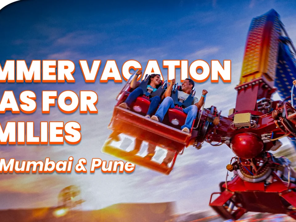 Happy family enjoying a high-thrill amusement park ride at Wet’nJoy, a top choice for summer vacation ideas near Mumbai and Pune with family-friendly water park offers.