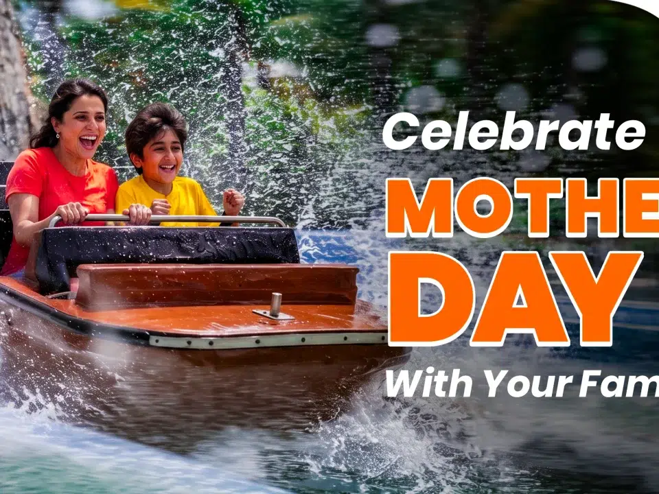 Mother and son smiling and splashing on a water log flume ride at Wet’njoy Water Park and Amusement Park in Lonavala for a Mother’s Day celebration.