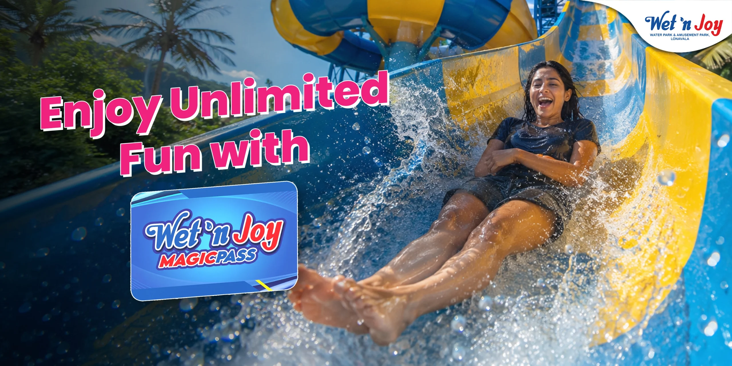 A happy woman sliding down a water slide at Wet’nJoy Water Park Lonavala with a Wet’nJoy Magic Pass for unlimited seasonal fun.