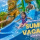 A family enjoying a blue water slide at Wet’nJoy Water Park Lonavala, one of the best places to visit in summer with kids near Mumbai and Pune.