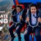Three colleagues screaming with excitement on a high-speed thrill ride at Wet'nJoy Lonavala, illustrating a fun corporate outing near Pune and Mumbai.