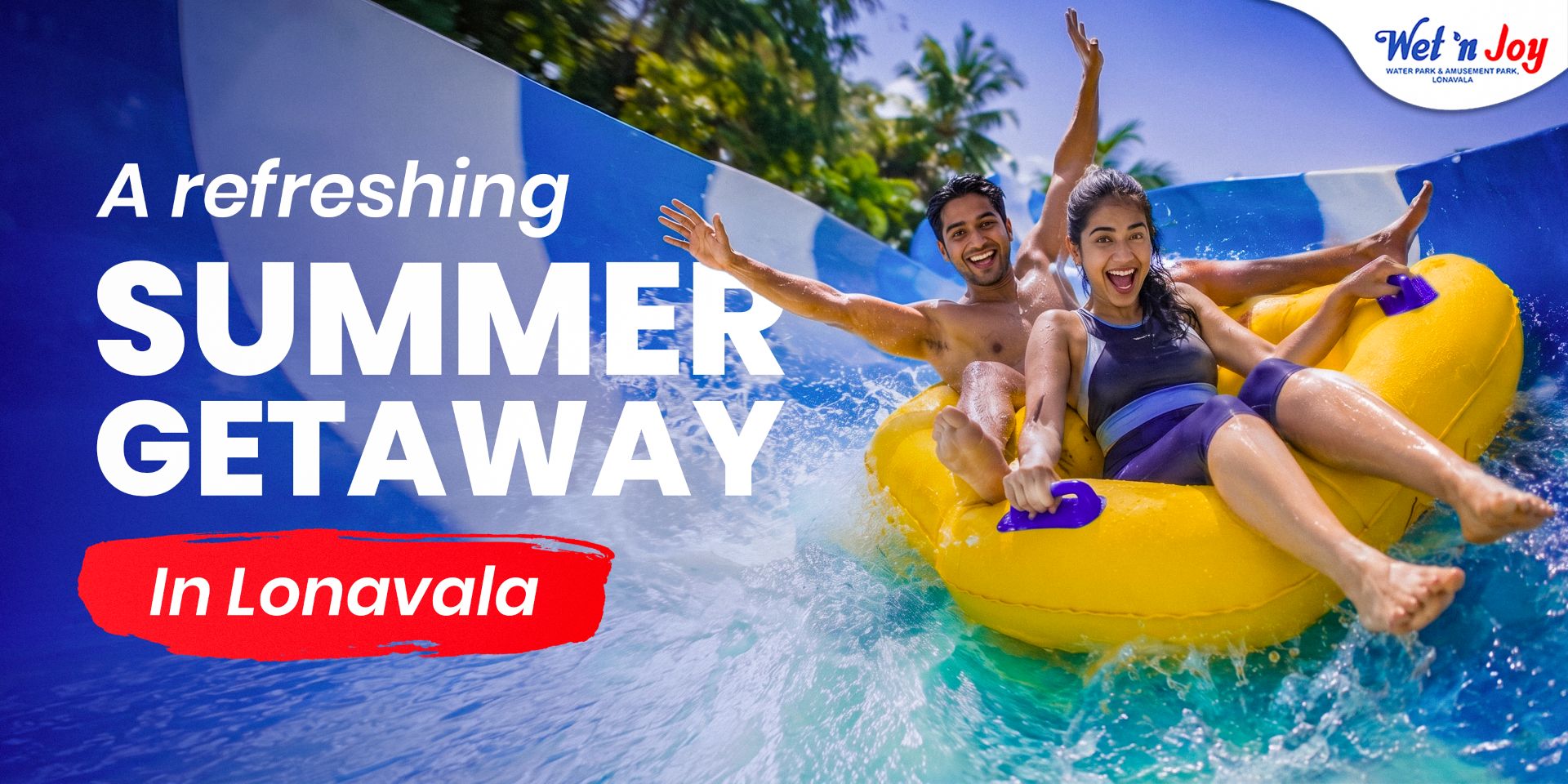 A happy couple laughing and splashing down a blue water slide on a yellow tube raft, highlighting fun summer activities and things to do in summer in Lonavala.