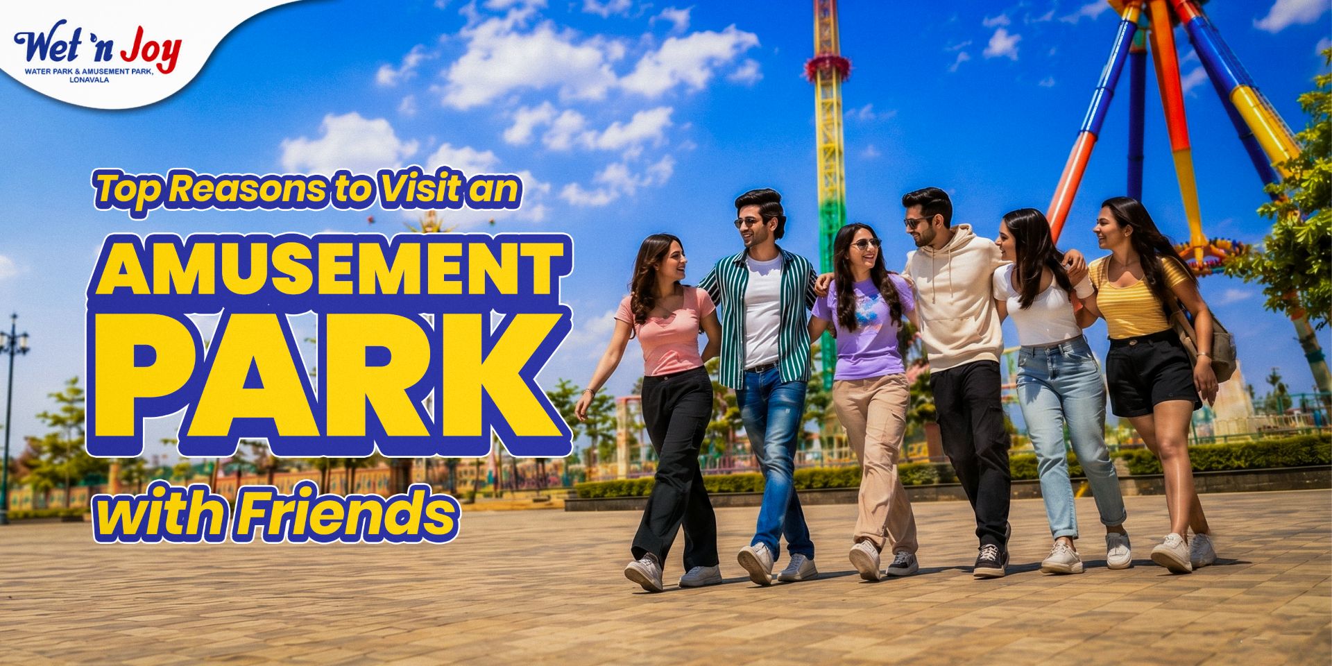 A group of friends laughing and standing in front of the amusement park rides at Wet’nJoy, Lonavala.