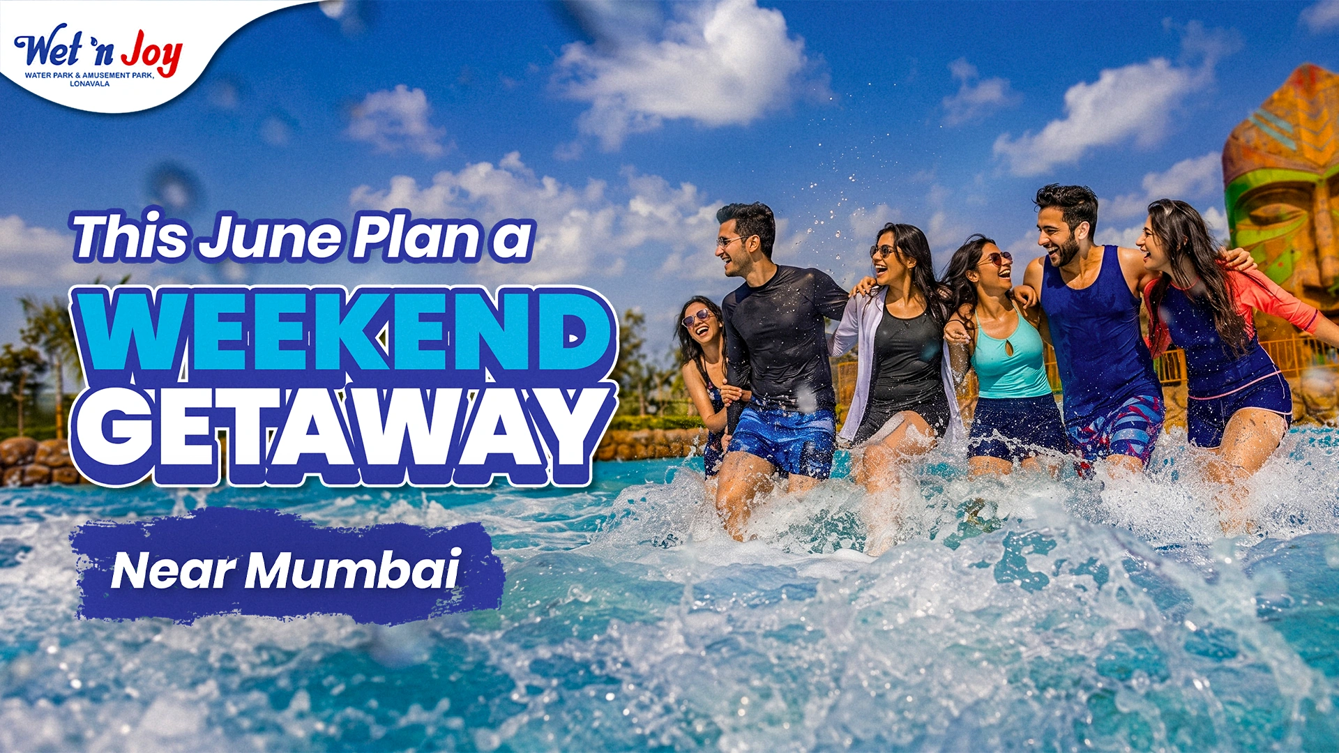 A group of young friends laughing, splashing, and wading through a wave pool during a weekend getaway near Mumbai in June to beat the summer heat at Wet'nJoy Water Park in Lonavala.