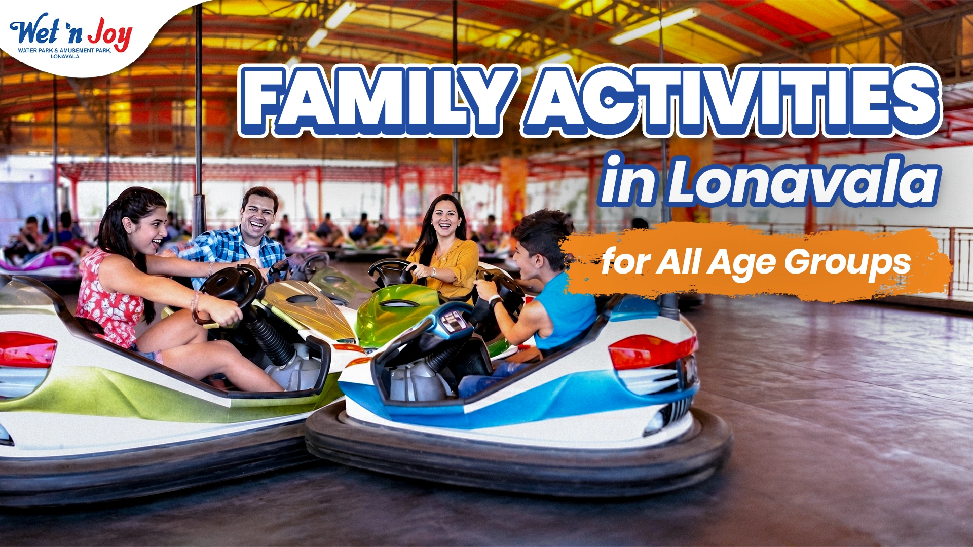 A happy multi-generational family laughing and riding bumper cars together, illustrating inclusive family activities and things to do in Lonavala with family at Wet’nJoy.